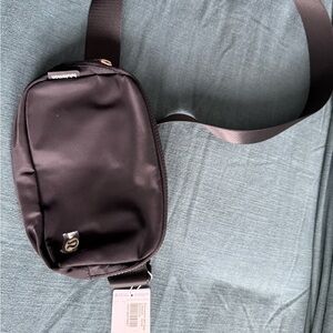 lululemon athletica Black Belt Bag with with GOLD logo and pull